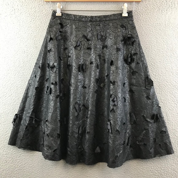 $398 BCBG MAXAZRIA ELSA FLOWER CUTOUT A-LINE SKIRT faux leather XS - Picture 1 of 11